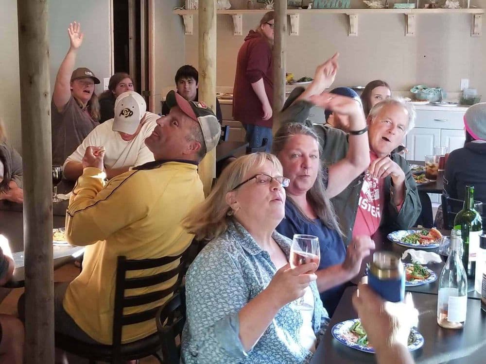 Group gathering in the community dining hall